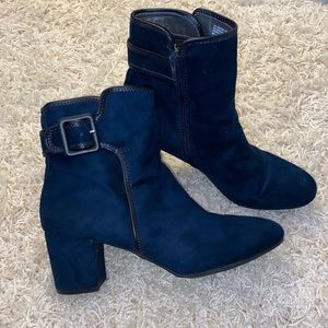 Women’s navy ankle boots.